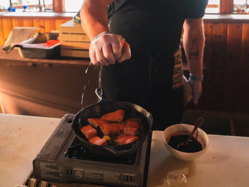 Cooking salmon demonstration by our chef at Salmon Falls Resort